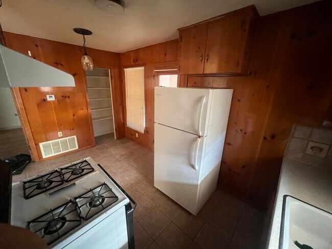 Kitchen with pantry in background - 3103 Burleson Rd