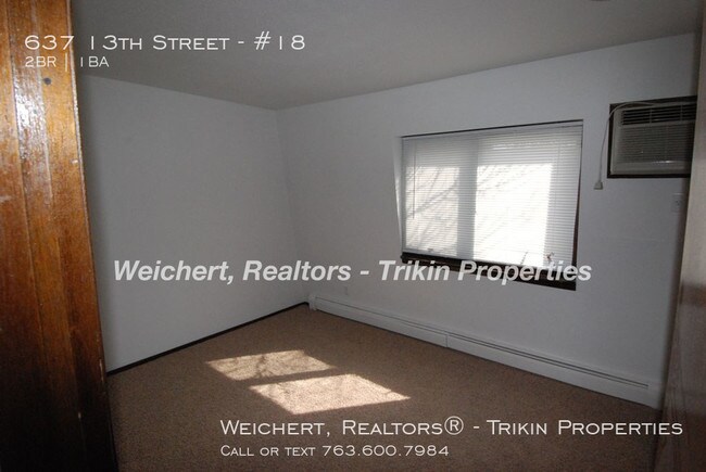 Building Photo - 637 13th St S