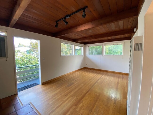 Building Photo - Top-Floor 1BD/1BA Apartment with Wood Ceilings, Garden Setting, and Easy North Berkeley BART Access