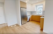 This contemporary 690 sq ft apartment in Richmond offers a thoughtfully designed living space with 2 bedrooms and 3 bathrooms. The open-concept layout maximizes the use of space, creating a seamless flow between the living areas. The kitchen is a standout feature, boasting light wood cabinetry, stainless steel appliances, and a window that allows natural light to flood the space. Large windows in the bedrooms and living areas not only provide ample natural light but also offer scenic views of the surrounding area. The bathrooms are sleek and modern, featuring glass shower enclosures and floating vanities. Light-toned hardwood flooring runs throughout the apartment, enhancing the sense of space and continuity. The primary bedroom, measuring 170 sq ft, provides a generous retreat. Storage solutions are integrated throughout, including built-in closets. The apartment's design emphasizes clean lines and a neutral color palette, creating a bright and airy ambiance that serves as a perfect canvas for personal style.
