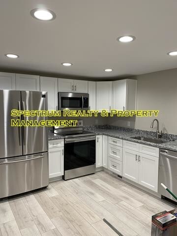 Building Photo - FEB RENT FREE! 3 bd Basement Apt in Pl Grove!
