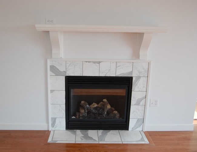 Working fireplace with marble surround in living room. - 485 Elmwood Ave