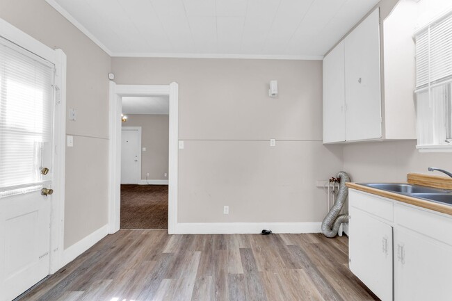 Building Photo - Charming Home with Updates and Covered Por...