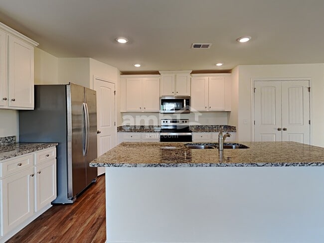 Foto del edificio - 6072 Mason Tucker Dr