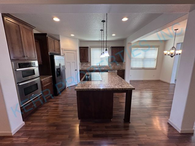 Building Photo - FREE RENT! Spacious 5-Bedroom Retreat with...