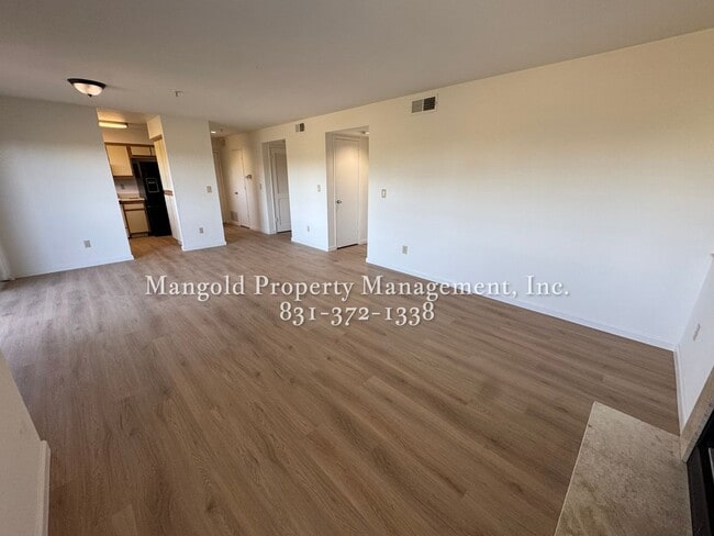 Building Photo - Spacious 2-Bed, 2-Bath Condo with Fireplac...