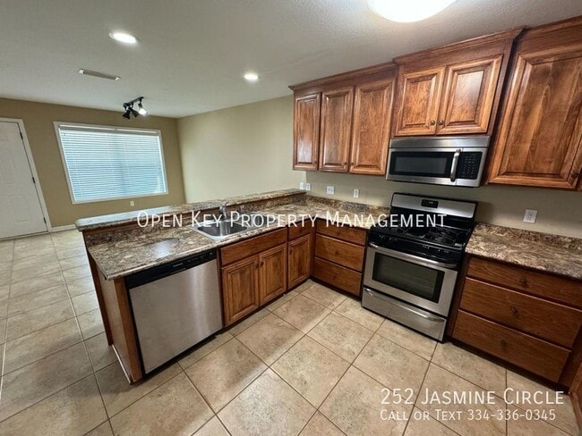 Building Photo - Beautiful 3/2 in Enterprise with Fenced Ba...