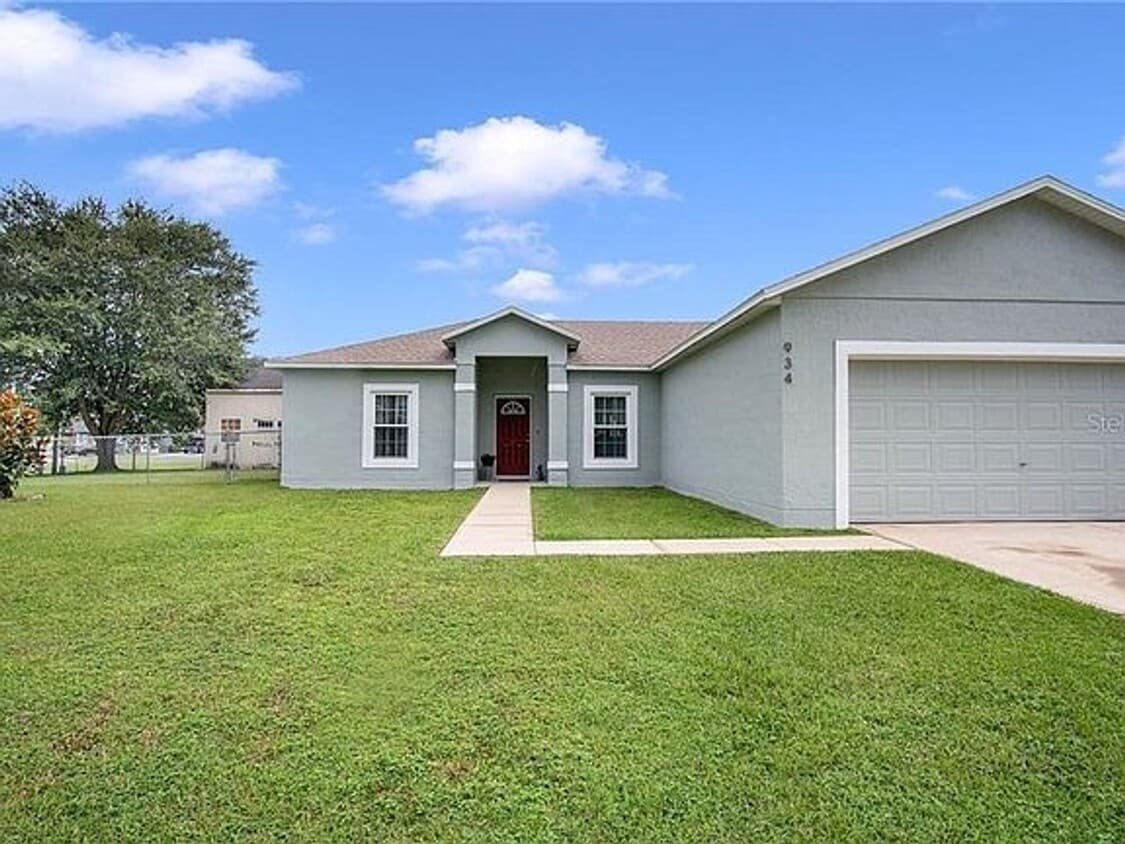 Primary Photo - SINGLE FAMILY HOME IN POINCIANA 3/2