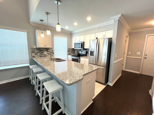 Building Photo - ONE MONTH FREE with a sixteen-month lease. Two Bedroom, Furnished Condo in Windsor Green in Carol...