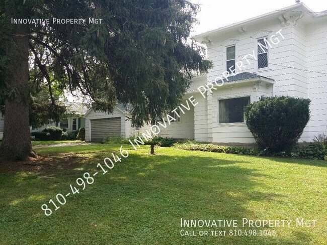 Building Photo - Spacious 4 bedroom , 1 1/2 bath home in Ga...