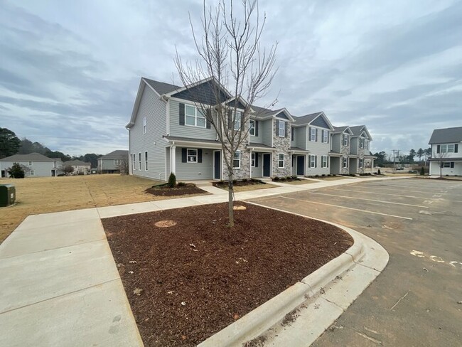 Building Photo - 2 bd 2.5 ba Townhouse