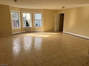 Building Photo - 13 12th Ave