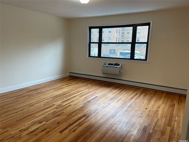 Building Photo - 201-24 43rd Ave
