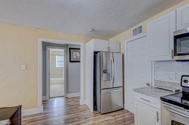 Building Photo - 4 br, 2 bath House - 1105 W 34th St