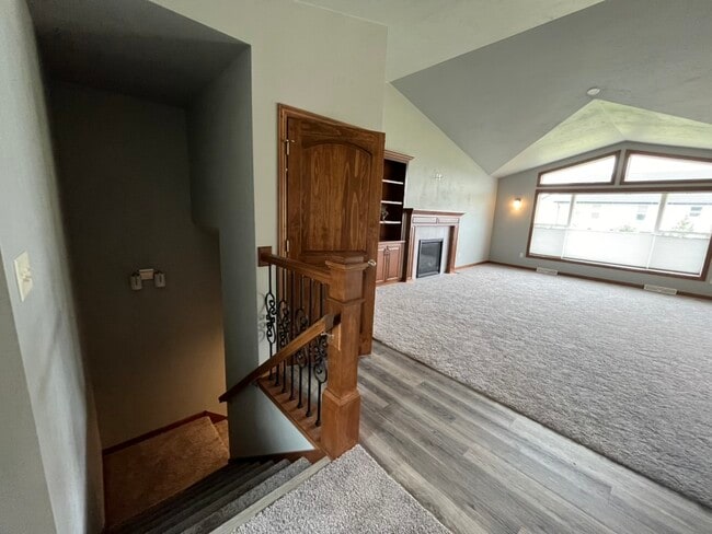 living-room-side-stairs - 1454 Chickory Ct