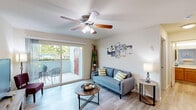 Located at 395 Ano Nuevo Avenue in Sunnyvale, CA, this single-floor, 1-bedroom, 2-bathroom home offers a well-organized layout designed for comfortable everyday living. Light wood-style flooring runs throughout, creating a bright and cohesive aesthetic across the space.

The combined kitchen and living room serves as the heart of the home. The galley-style kitchen is equipped with warm oak cabinetry extending to the ceiling, stainless steel appliances including a refrigerator, dishwasher, microwave, and range, along with white countertops and a skylight that adds natural illumination. The adjacent living area features a ceiling fan with light fixture and sliding glass doors that open directly to a private outdoor patio, allowing abundant natural light and seamless indoor-outdoor flow.

The bedroom offers a comfortable, well-proportioned retreat with a large sliding-door closet, a window for natural light, and easy access to the bathrooms. Both bathrooms feature light wood-style flooring, warm oak vanity cabinetry, and clean white finishes. One bathroom includes a shower-tub combination.

Additional spaces include a hallway and a dedicated pantry, providing practical storage solutions. The overall ambiance is clean, functional, and inviting, well-suited for those seeking a manageable yet complete living space in the heart of Sunnyvale.