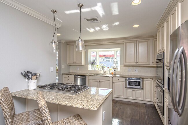 Building Photo - Rates Vary: $6,495 - $12,495