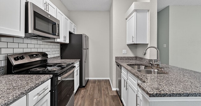 Building Photo - The Versailles Apartments