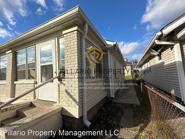 Foto del edificio - 3 br, 1 bath House - 1250 W 35th St