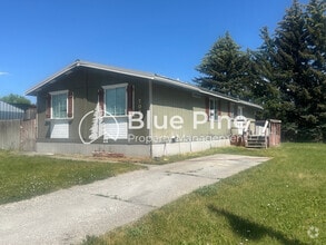 Building Photo - 705 Eve Dr