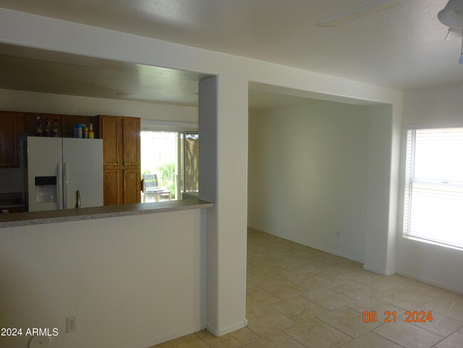 Building Photo - 12605 W Charter Oak Rd
