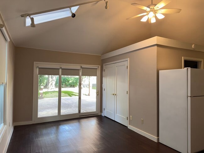 Interior, showing vaulted ceiling, fan and skylight - 3925 Gaspar Dr