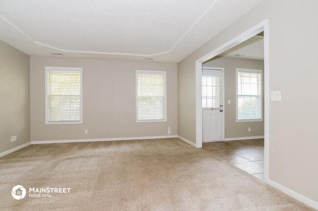 Building Photo - 1602 Cooper Dr, Raymore, MO 64083