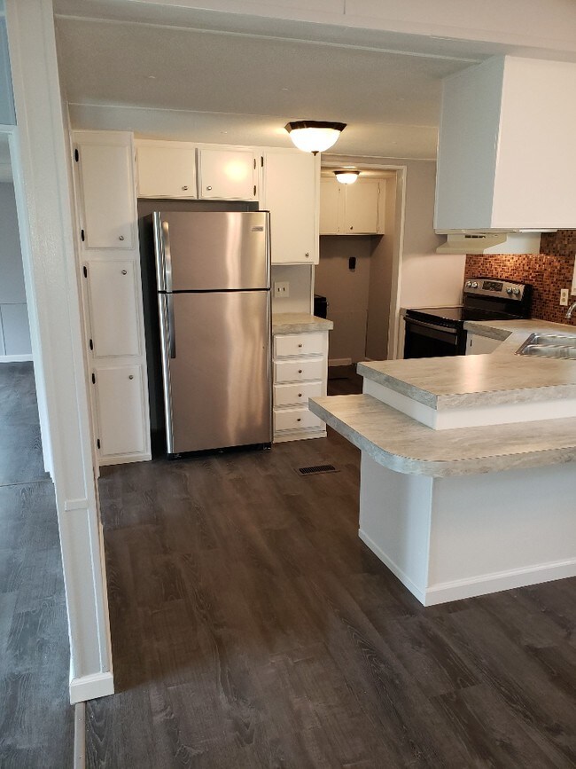 Building Photo - 6173 Pine Rd