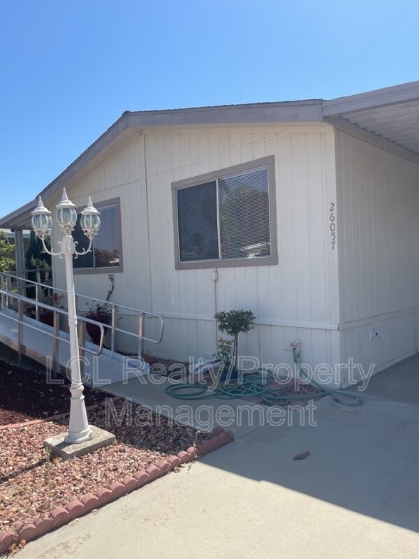Building Photo - 26057 Fountain Palm Dr