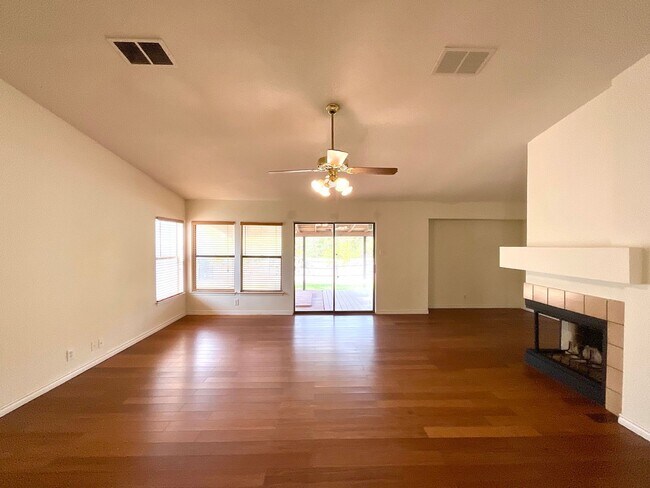 Building Photo - Spacious 3-Bedroom, 2-Bath Home With Fireplace, Fenced Backyard, and Two-Car Garage!