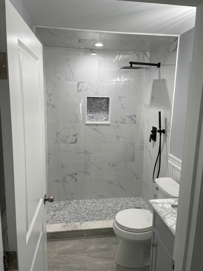 Full marble shower - 333 Central St Apartments