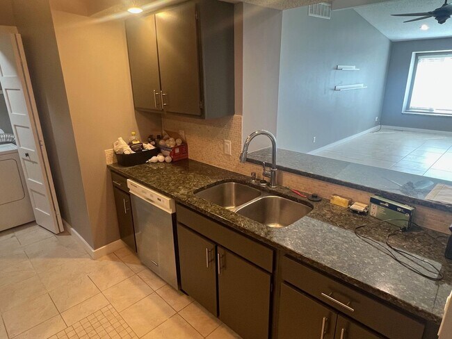 Building Photo - Updated Condo with Water view - Available ...