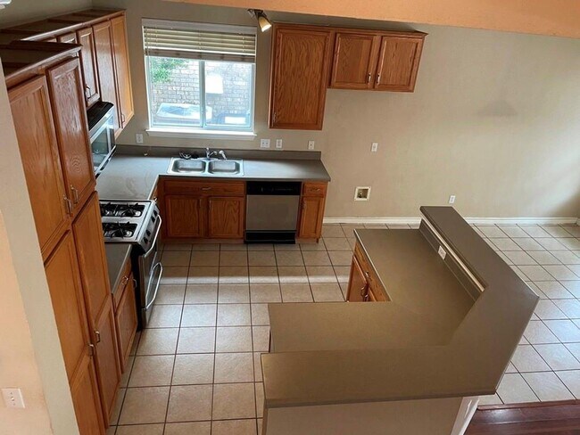Building Photo - Spacious open floor plan with this desirab...