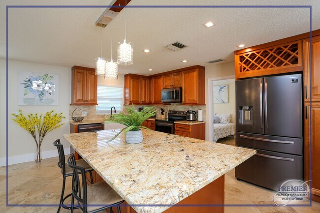 Foto del edificio - *** LOCATION LOCATION LOCATION ** THIS NICELY DECORATED 4/3 HOME CLOSE TO MERCATO *** PERFECT FOR...