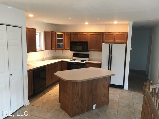 Building Photo - 4 br, 3 bath House - 4102 E 8th Ave