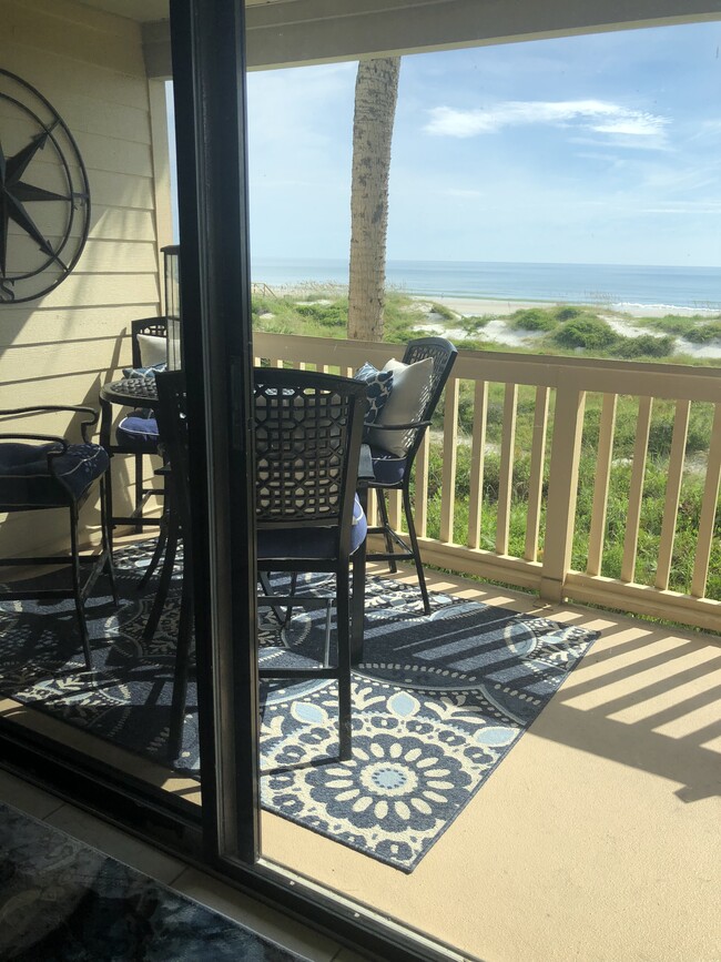 Enjoy your morning coffee on your private balcony with direct ocean vew! - 6100 A1A S
