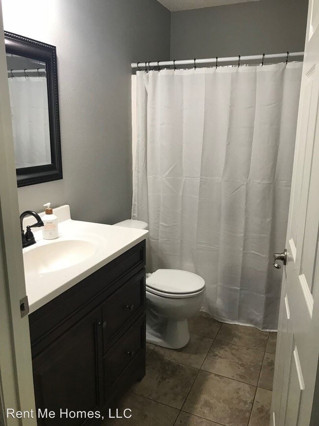Building Photo - 4 br, 2 bath House - 103 Bird of Paradise Dr.