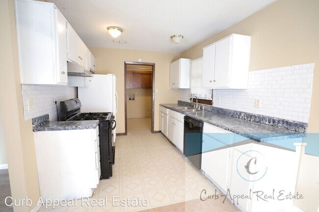 Building Photo - 3 br, 1.5 bath House - 1425 Overhill