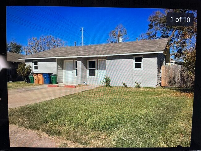 Brick painted exterior: Rt Unit-this is an older photo, trees in front yard now - 5802 Tracy Lynn Ln