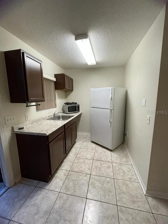Building Photo - 402 Orchid Dr