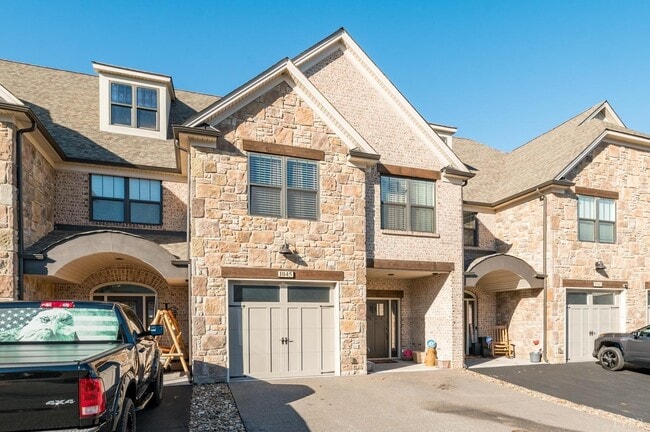 Main Entrance - Garage and 2 Outdoor Parking Spaces - 1045 Presidents Ln Townhome
