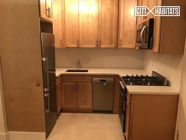 Foto del edificio - 63 E 125th St