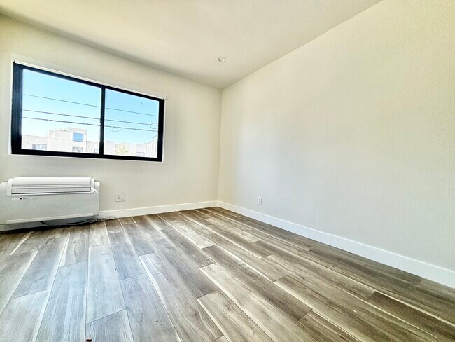 Building Photo - 6958 Woodman Ave Van Nuys, CA 91405