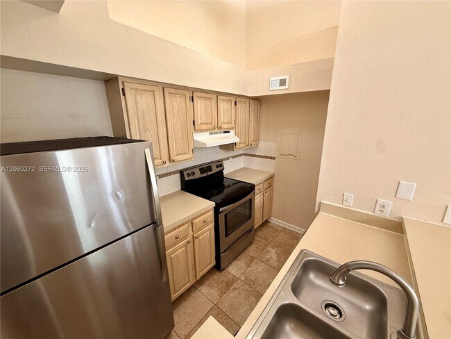 Building Photo - 1845 Palm Cove Blvd