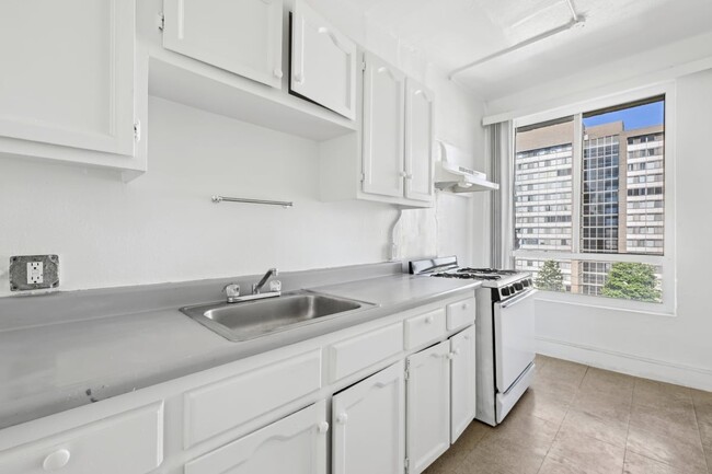 Union a kitchen with white cabinetry and a window - Westland @ Union