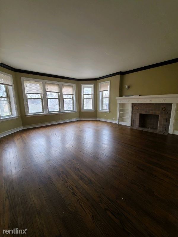 Building Photo - 2 br, 1 bath Apartment - 7147 S Cornell Ave