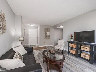The living room 1 of 2. - 4500 S Four Mile Run Dr