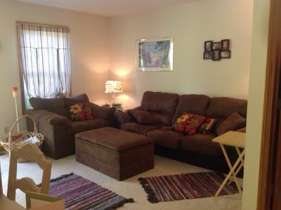 Living room with previous tenants furniture ( not included ) - 2805 Thackeray Ave NW