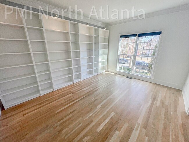 Building Photo - Pet Friendly, with a Fenced-in Backyard.