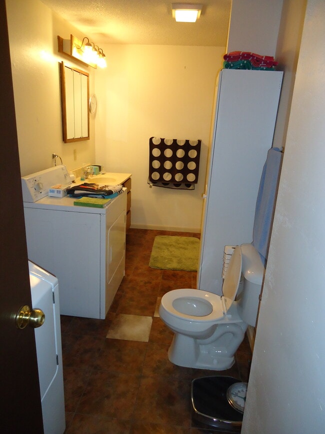 Large bathroom with tub/shower and washer &amp; dryer. - 745 Clark St